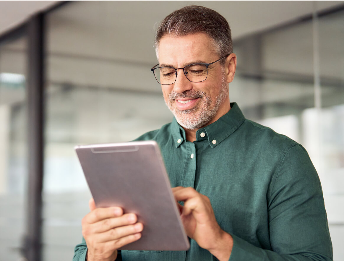 man holding a tablet